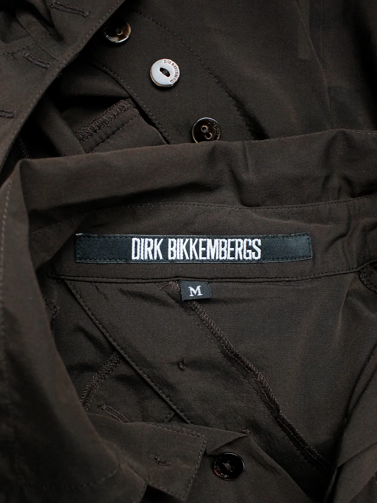 Dirk Bikkembergs brown bodysuit shirt with open back and rows of buttons