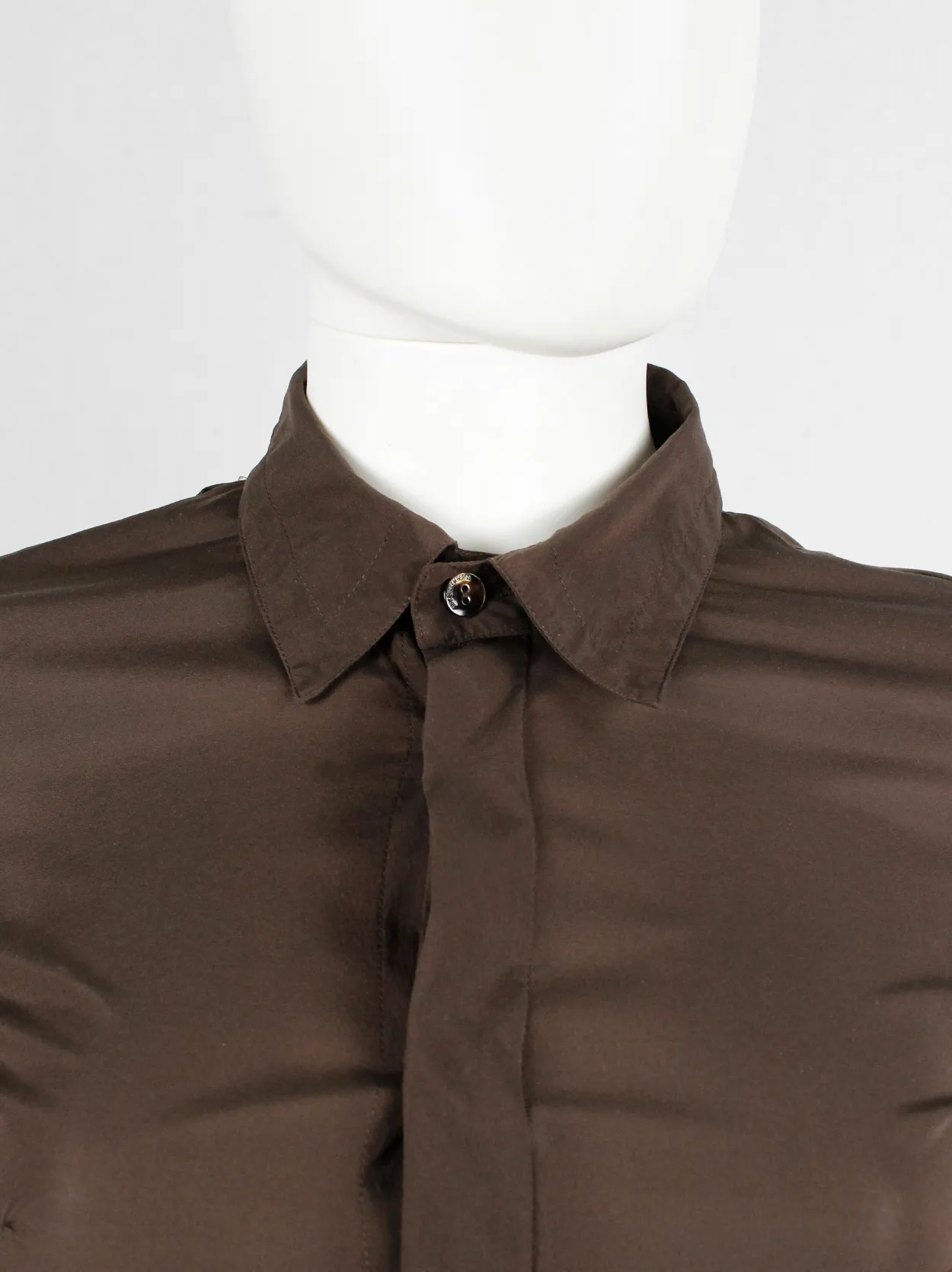 Dirk Bikkembergs brown bodysuit shirt with open back and rows of buttons